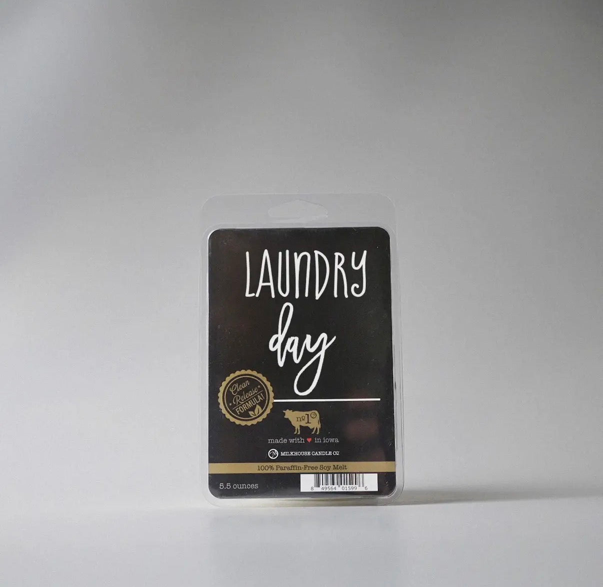 Wax melts product with 'Laundry day' label on a gray background